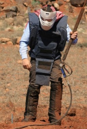 weaing boots, armour and mask inside the minefield